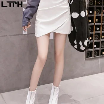 LTPH Módne Mini kórejský sukne Asymetrické PU kožené Záhyby Split Vysoký Pás Package Hip Biele ženy sukne 2020 Jeseň Nové